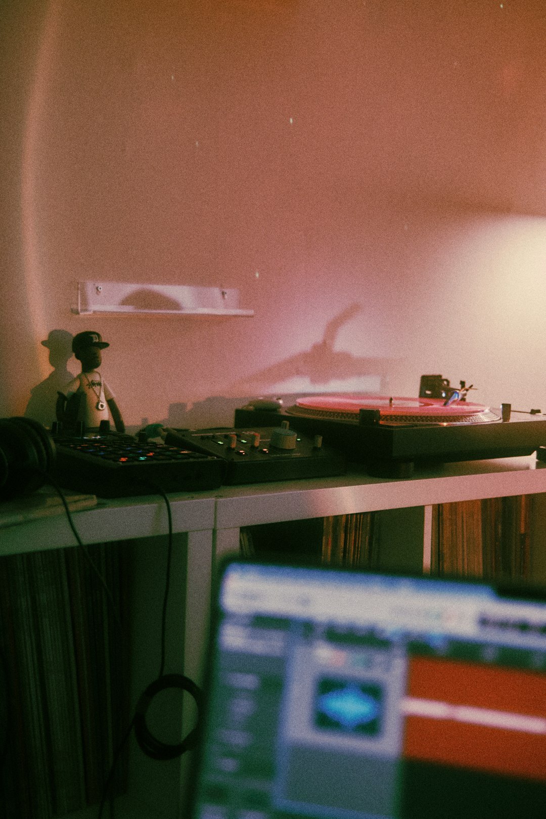Swiss video editor working on a film timeline at a desk